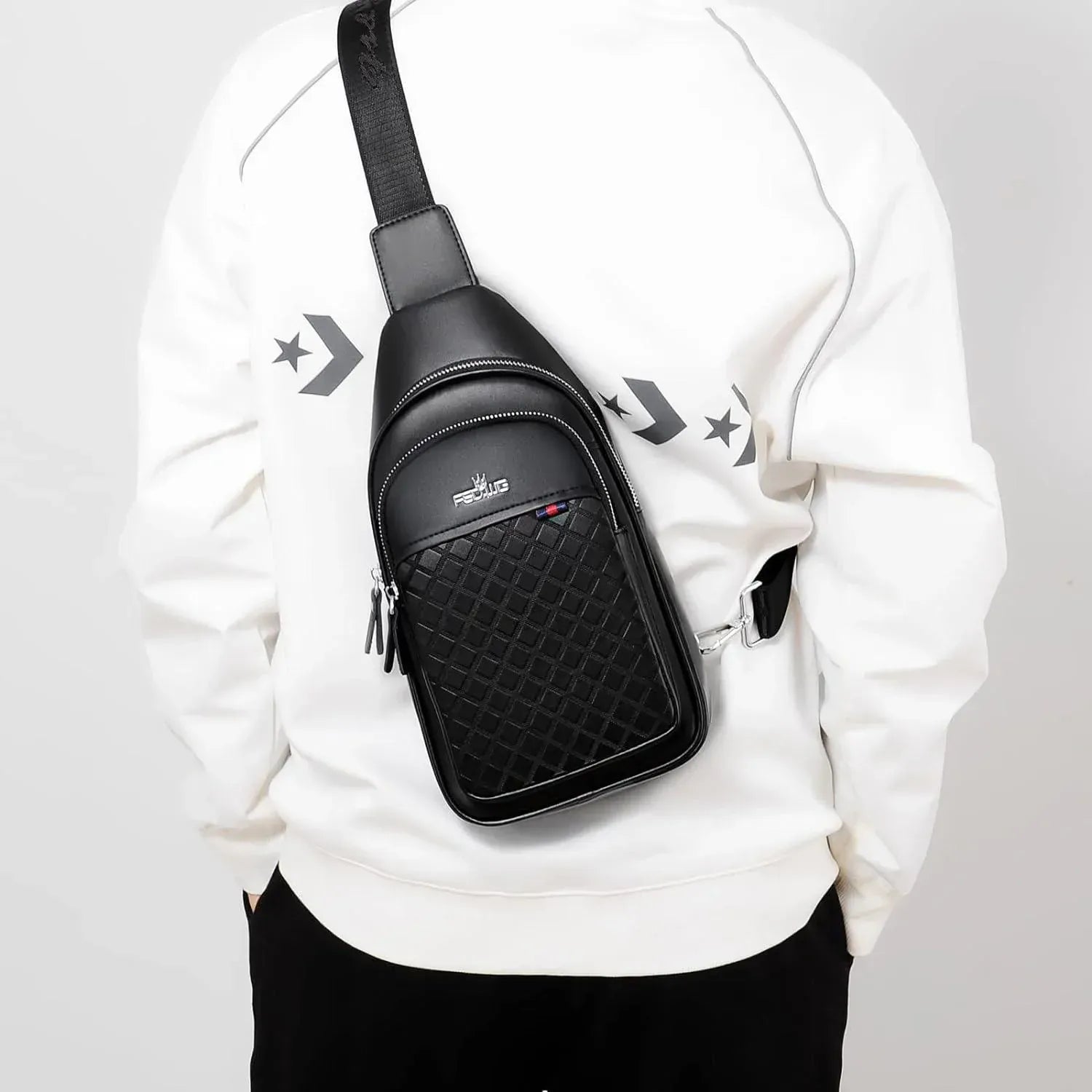 Men's black leather crossbody chest bag with quilted pattern by FR Fashion Co.